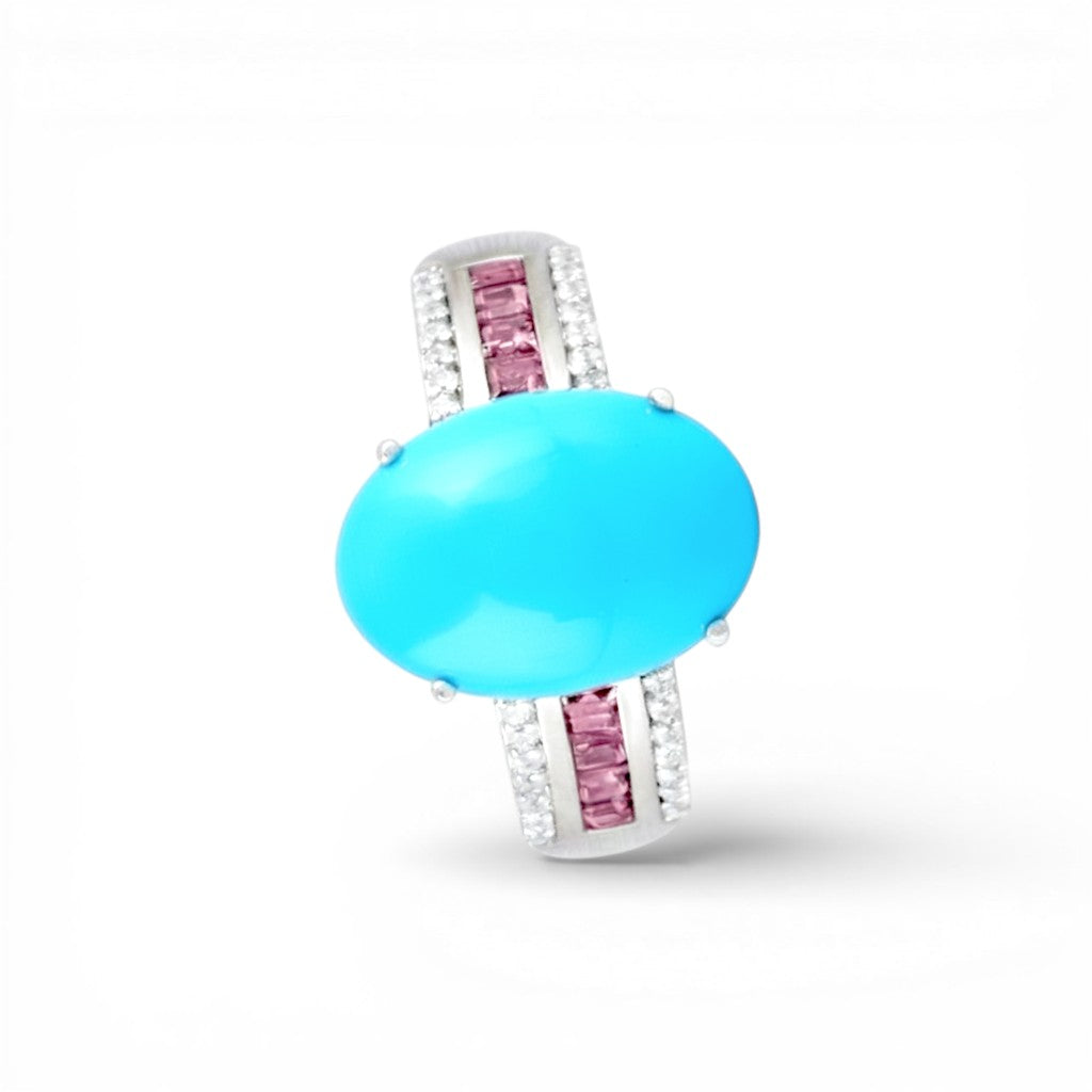 Sophia Schneider Joyas sterling silver ring with oval turquoise and baguette pink tourmaline accents.