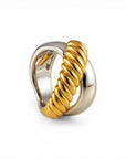 Sophia Schneider Joyas chunky two-tone ring with intertwined silver and gold bands, one twisted.