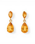 Sophia Schneider Joyas 18K yellow gold stud earrings with pear-cut citrine gemstones.