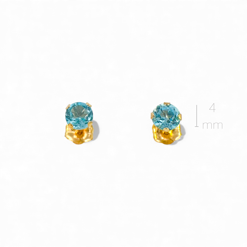 Aros stud topacio azul en grifa oro 10K