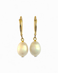 Aros colgantes perla oval en oro 14K