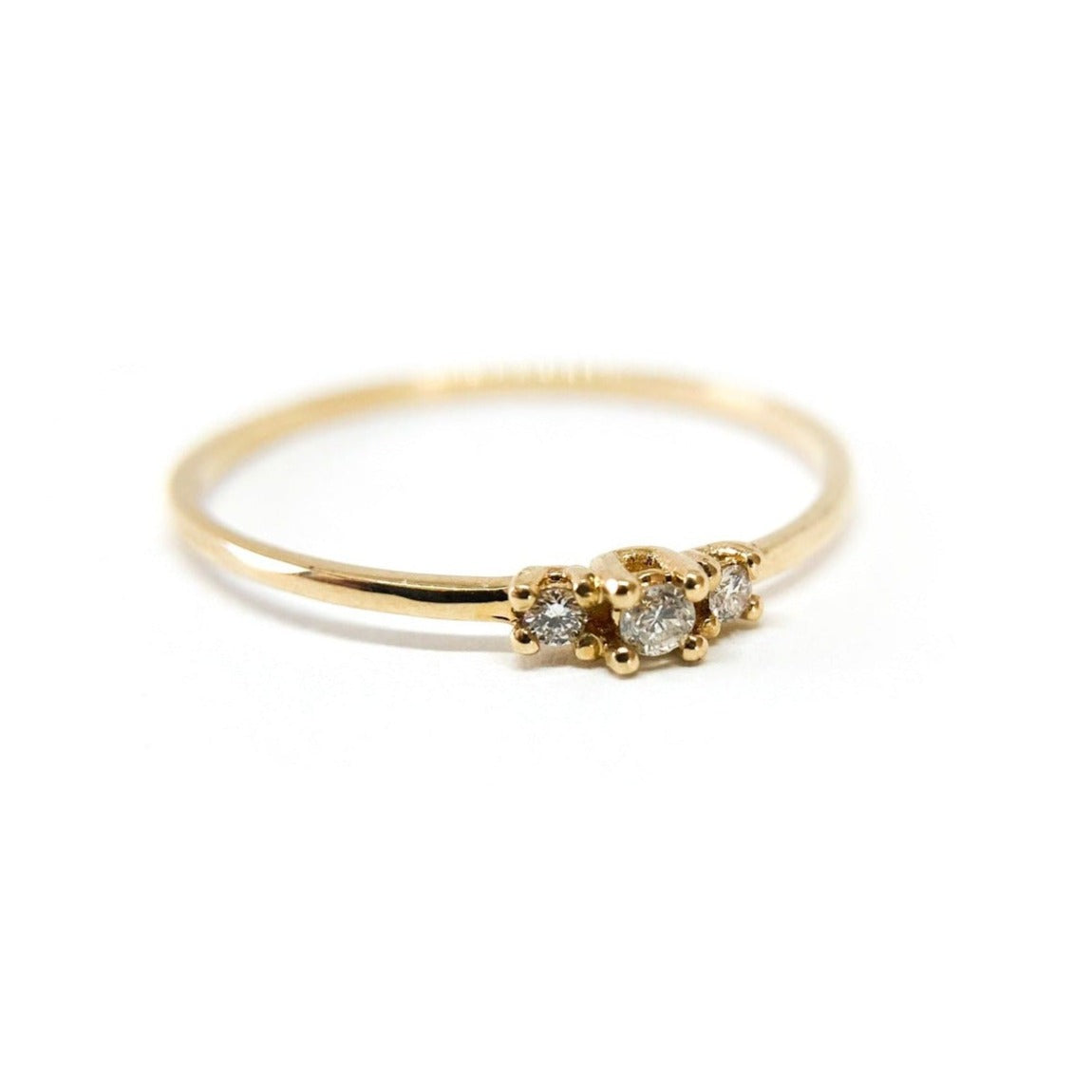 Anillo Tricillo Central 0,05 Ct y laterales de 0,02.5 Ct Gold